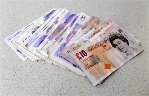 Free Stock Photo 12901 british pound notes on table | freeimageslive