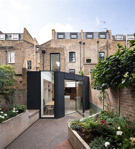 https://images.opumo.com/wordpress/wp-content/uploads/2022/01/opumo-refurbished-victorian-terraces_0002_02_FraherArchitects_SignalHouse_%C2%A9Adam_Scott.jpg?utm_source=chatgpt.com