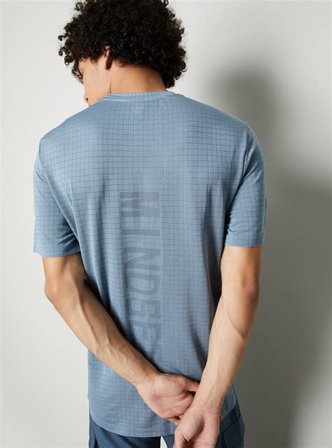 Buy Men Jacquard Grid Training T-shirt Online at just Rs. 699.0 ...