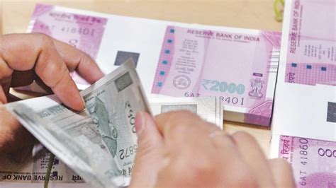 Rupee slips 15 paise to 74.70 against US dollar in early trade ...