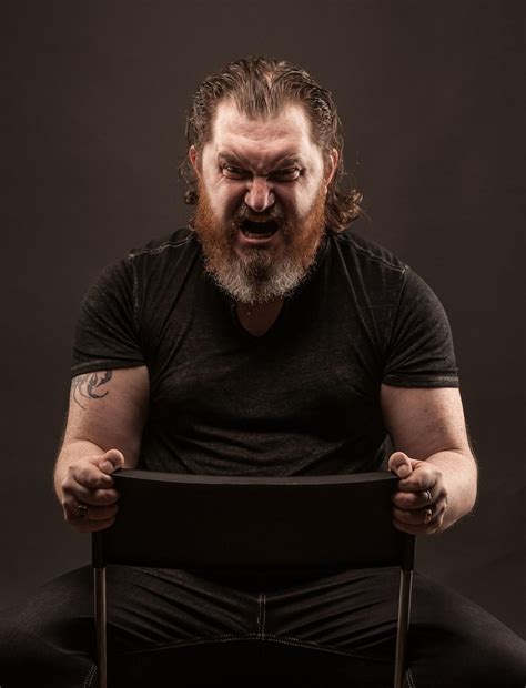 Man sitting chair looking angry Images - Free Download on Freepik