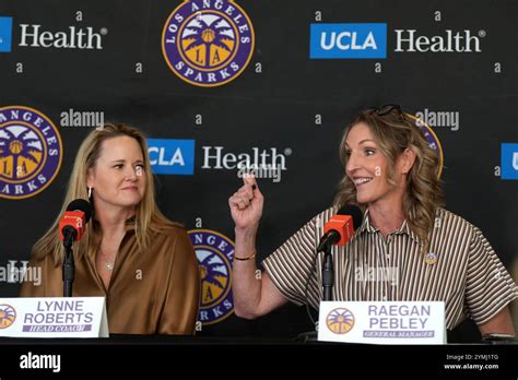 Lynne Roberts (left) is introduced as the LA Sparks basketball coach by ...