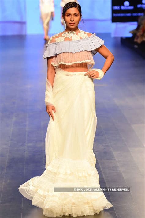 A model showcases a creation by designer Archana Rao on Day 1 of the ...