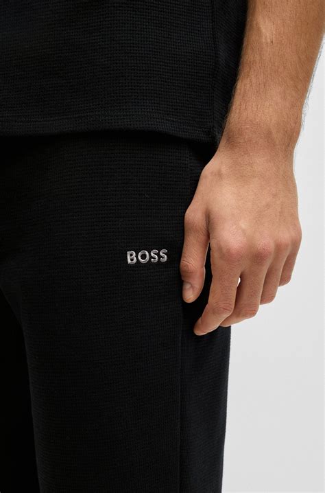 BOSS - Cotton-blend waffle pyjama bottoms with embroidered logo - Black