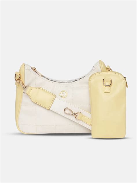 Buy Caprese Aurora Small Yellow Sling Bag @ Rs.1649 | Caprese Bags
