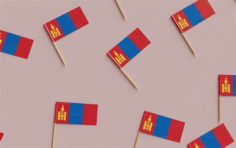 A group of red and blue flags sitting on top of a table photo ...