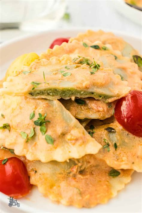 Homemade Spinach Ricotta Ravioli With Tomato Cream Sauce