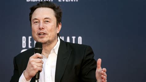Elon Musk speaks during an interview with head of TED Chris Anderson (out of frame) at the TED2022: