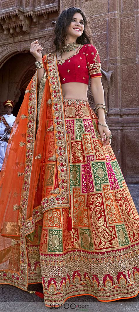 Red and orange banarasi silk lehenga choli with embroidered border ...