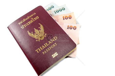 在桌上的泰国护照高清摄影大图-千库网