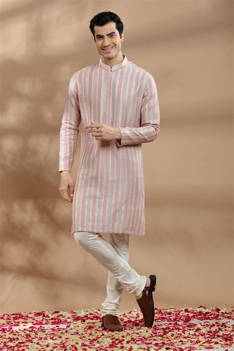 Pastel Pink Silk Kurta with Stripes and conceal placket detail.