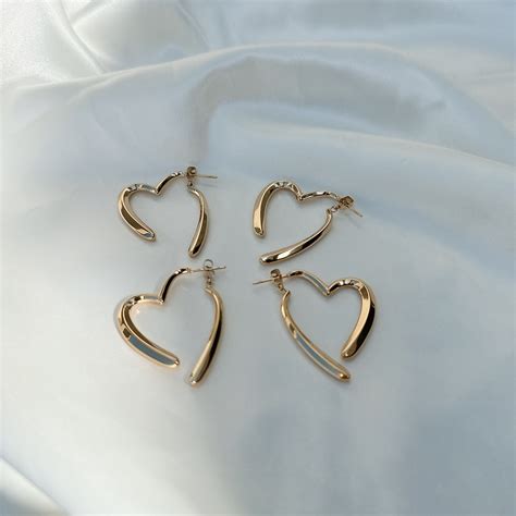 stainless heart catch pierce | AKINAWAN