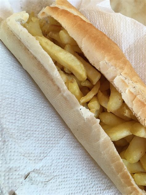 a baguette with french fries in it, it's called "an american" where I ...
