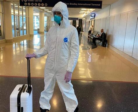 Naomi Campbell shows up dressed in a hazmat suit, surgical mask amid ...