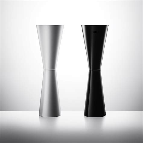 Tall slim vases in matte black and white on white background | Premium ...