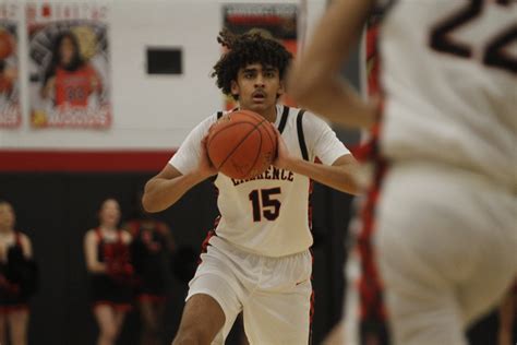 Lawrence boys, girls basketball teams drop home games against Olathe ...