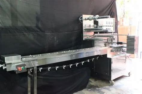 Flow Wrap Machine - fruit cake packing machine Manufacturer from Bengaluru