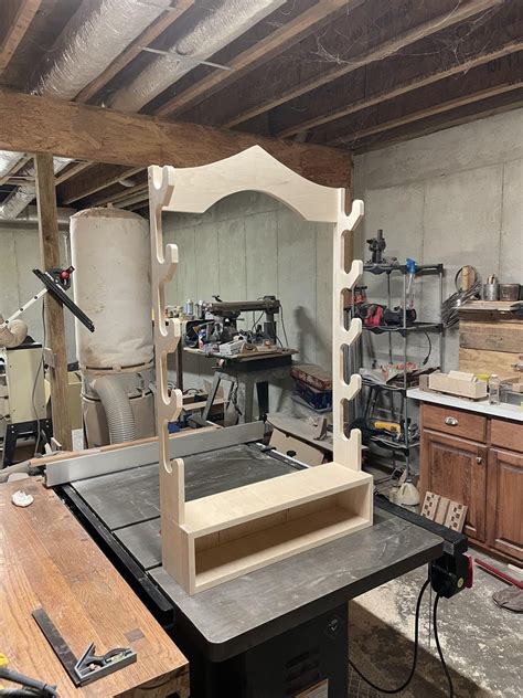 Almost finished with this wall rack for metal tubes that eject projectiles at high rates of ...