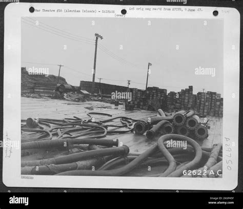 Surplus rubber piping and boxed equipment deteriorating on loading ...