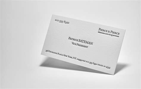 What are the key design elements of Patrick Bateman's business card and ...
