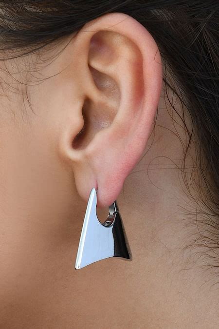 Buy Silver Plated Enchanted Lock Huggies by Arvino Online at Aza Fashions.