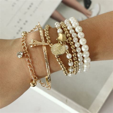 Vembley Gold Plated Pearl Studded Multistrand Korean Bracelet For Wome