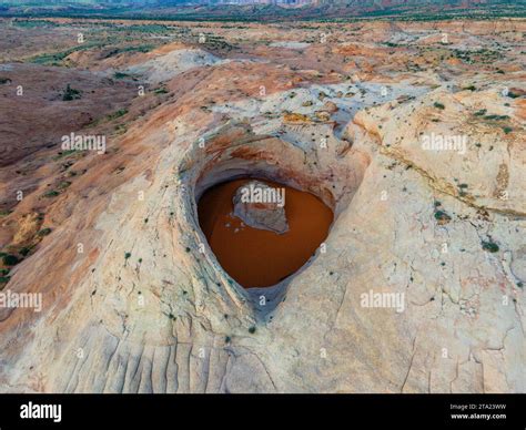Photograph of the Cosmic Ashtray, a uniquely eroded sandstone formation ...