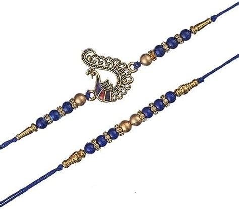 eCraftIndia Purple Set of 2 Floral & Pearl Designer Rakhis with Roli ...