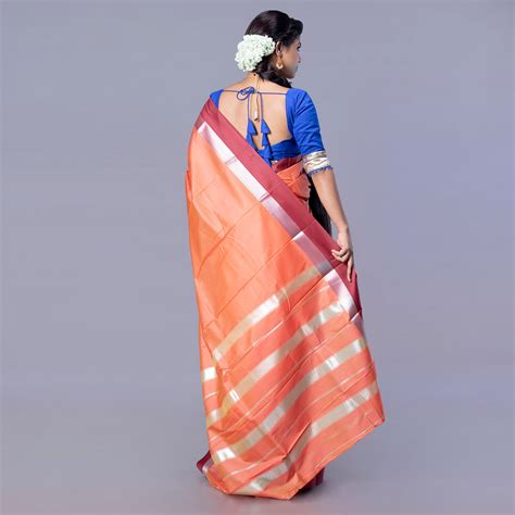 Kanjivaram silk saree in rust color with maroon and silver border – Boveee
