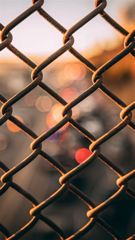 Download wallpaper 2160x3840 lattice, fence, grid, glare samsung galaxy ...