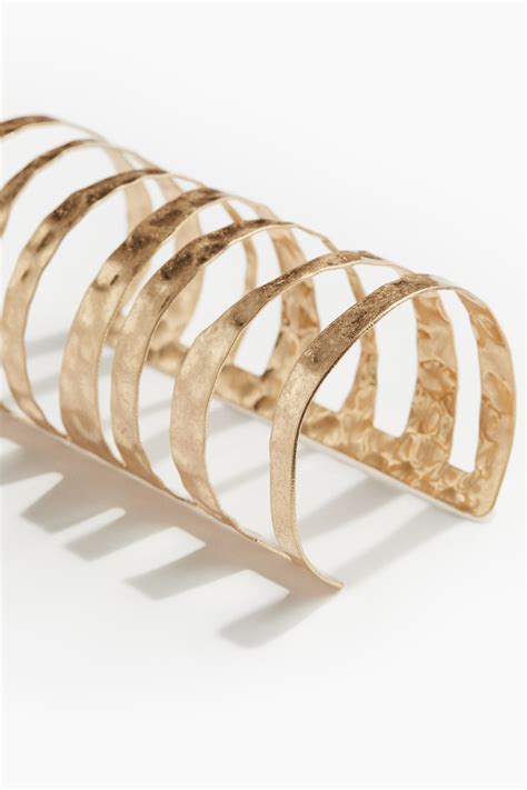 Long arm cuff - Gold-colored - Ladies | H&M PH