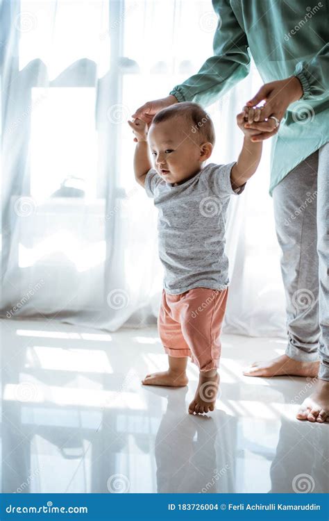 Baby first step stock photo. Image of baby, playing - 183726004