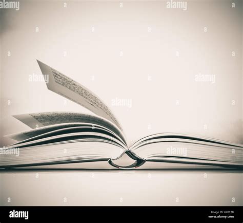 The opened book on white background Stock Photo - Alamy