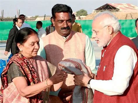 PM with a cultural troupe - Choicest pics: PM Narendra Modi attends DGP ...