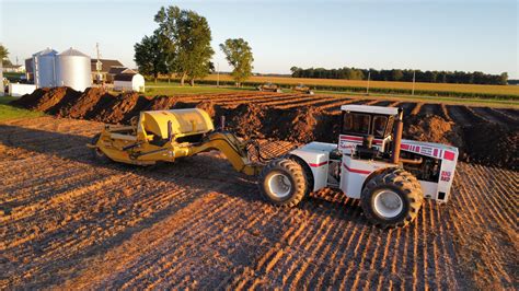 Image result for Scraper Pan Tractor