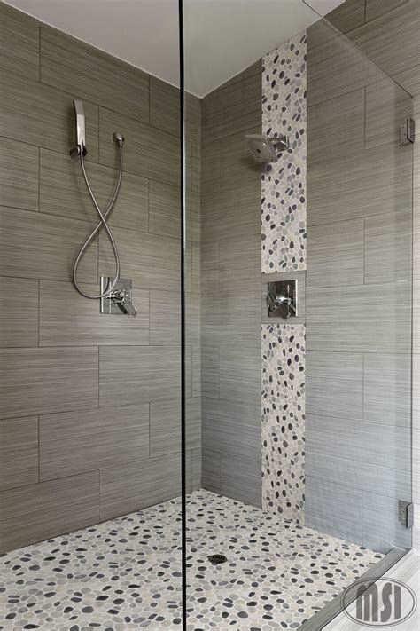Love the pebble glass waterfall vertical design and the matching shower ...