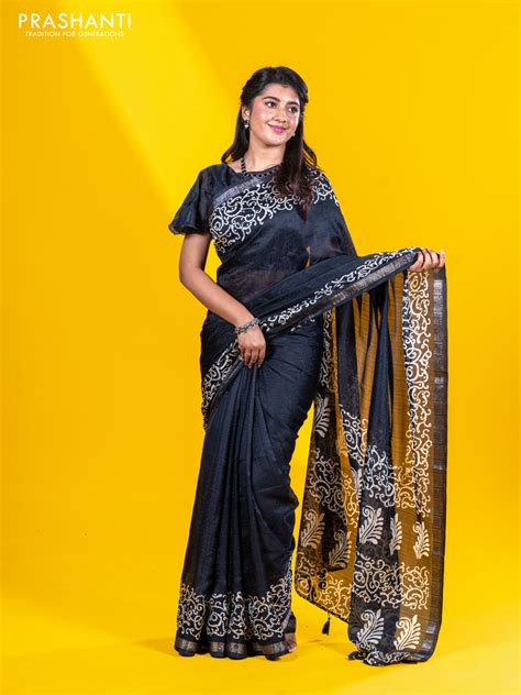 Semi crepe saree black with allover self emboss and batik printed bord ...