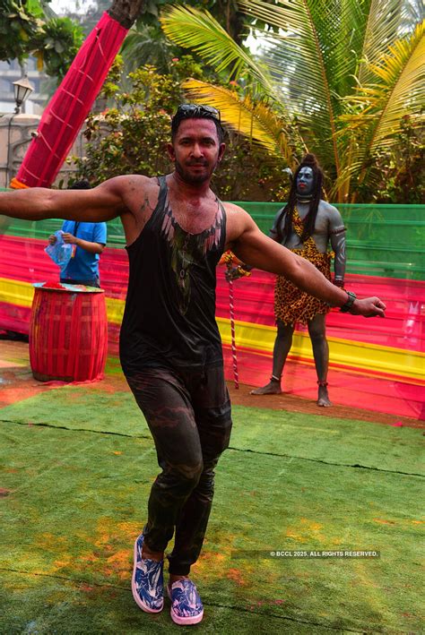 Sonnalli Seygall poses with a water gun during Vineet Jain's Holi party ...