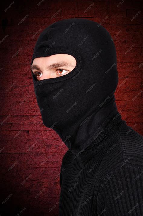 Premium Photo | Robber in mask