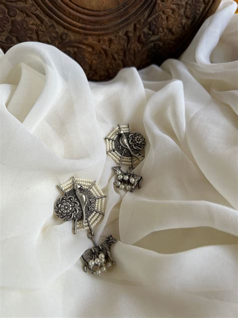 Parrot cow tribal earrings – House of Jhumkas