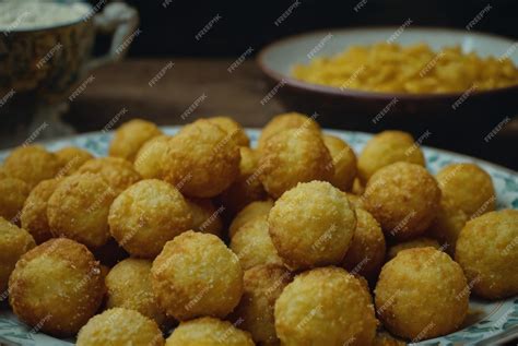 Premium Photo | A fried dough snack made from cornmeal shaped into balls