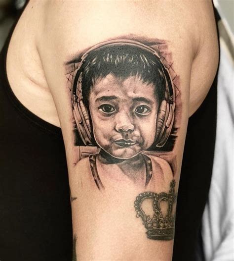 Child / Baby Tattoo Designs & Ideas for Men and Women