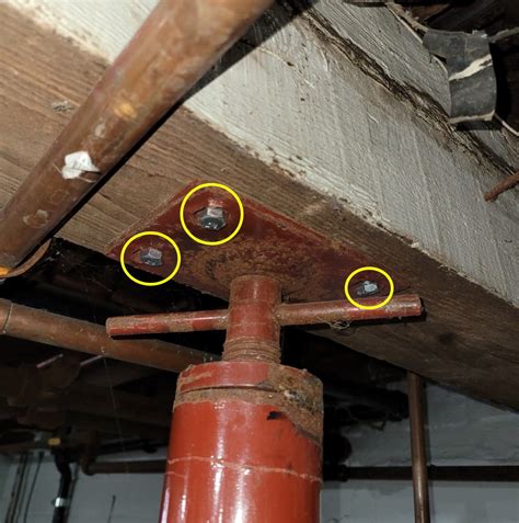 Inspecting Adjustable Steel Columns | HomesMSP | Real Estate Minneapolis