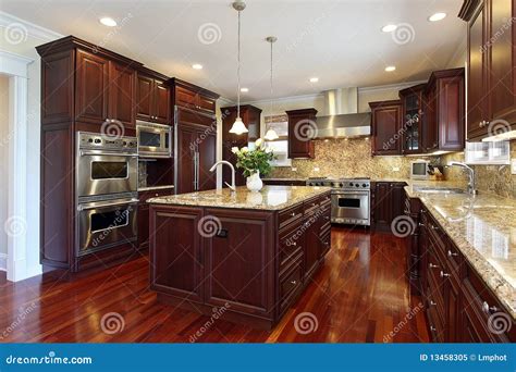 Kitchen with Cherry Wood Cabinetry Stock Image - Image of interior ...