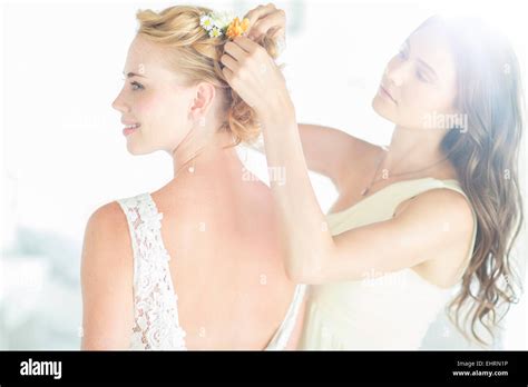 Image result for Bridesmaid Helping Bride