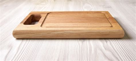 Cutting board on table | Premium Photo