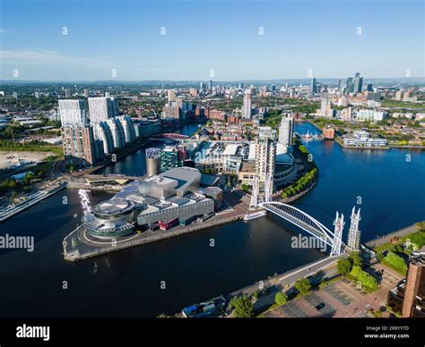 Aerial view of The Lowry Centre at Salford Quays with Manchester in ...