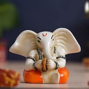 Buy eCraftIndia White & Orange Polyresin Handcrafted Lord Ganesha Idol ...