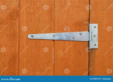 Shed door hinge stock photo. Image of fitted, woodgrain - 34803742