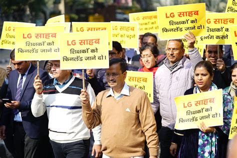 AAP vs LG: Delhi CM Kejriwal takes to street in protest against LG THE ...